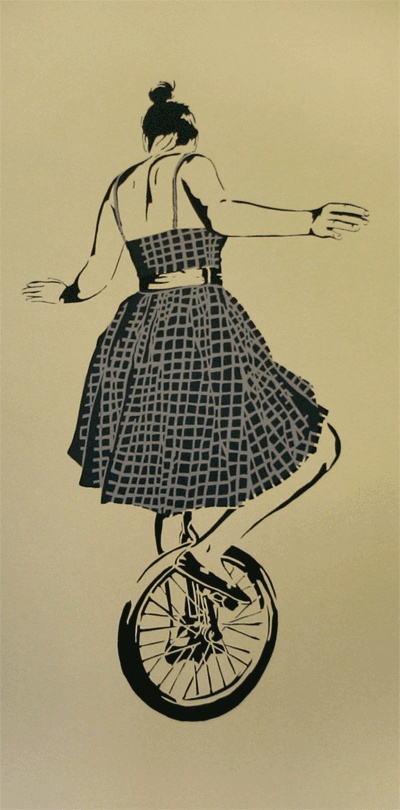 Woman in a plaid summer dress, riding a unicycle