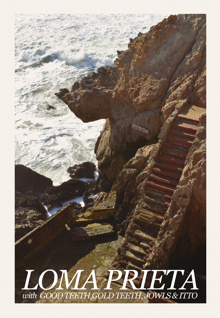 Photo of stone steps leading down a cliff to the seashore