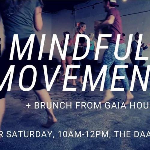 Mindful Movement Workshop + Brunch. Several people in action poses at the DAAC space