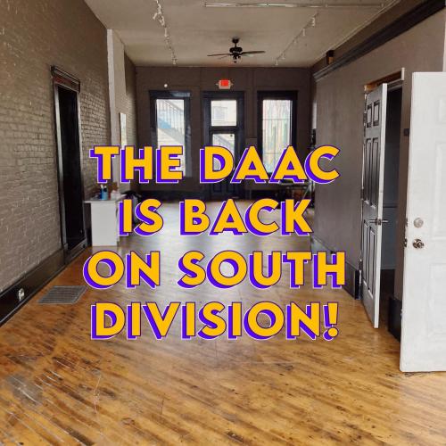 Empty venue with wood floors and orange text superimposed: THE DAAC IS BACK ON SOUTH DIVISION!